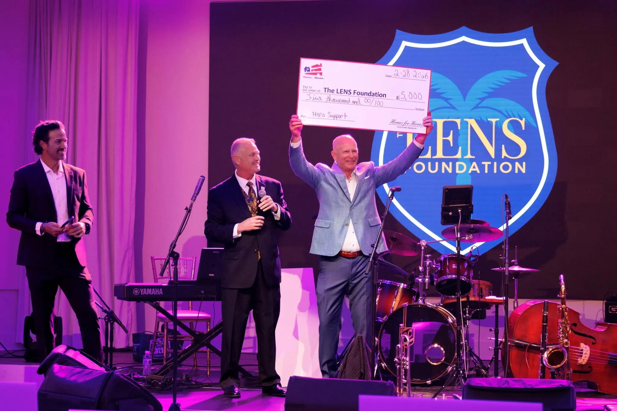Check presentation on stage at the 2026 gala